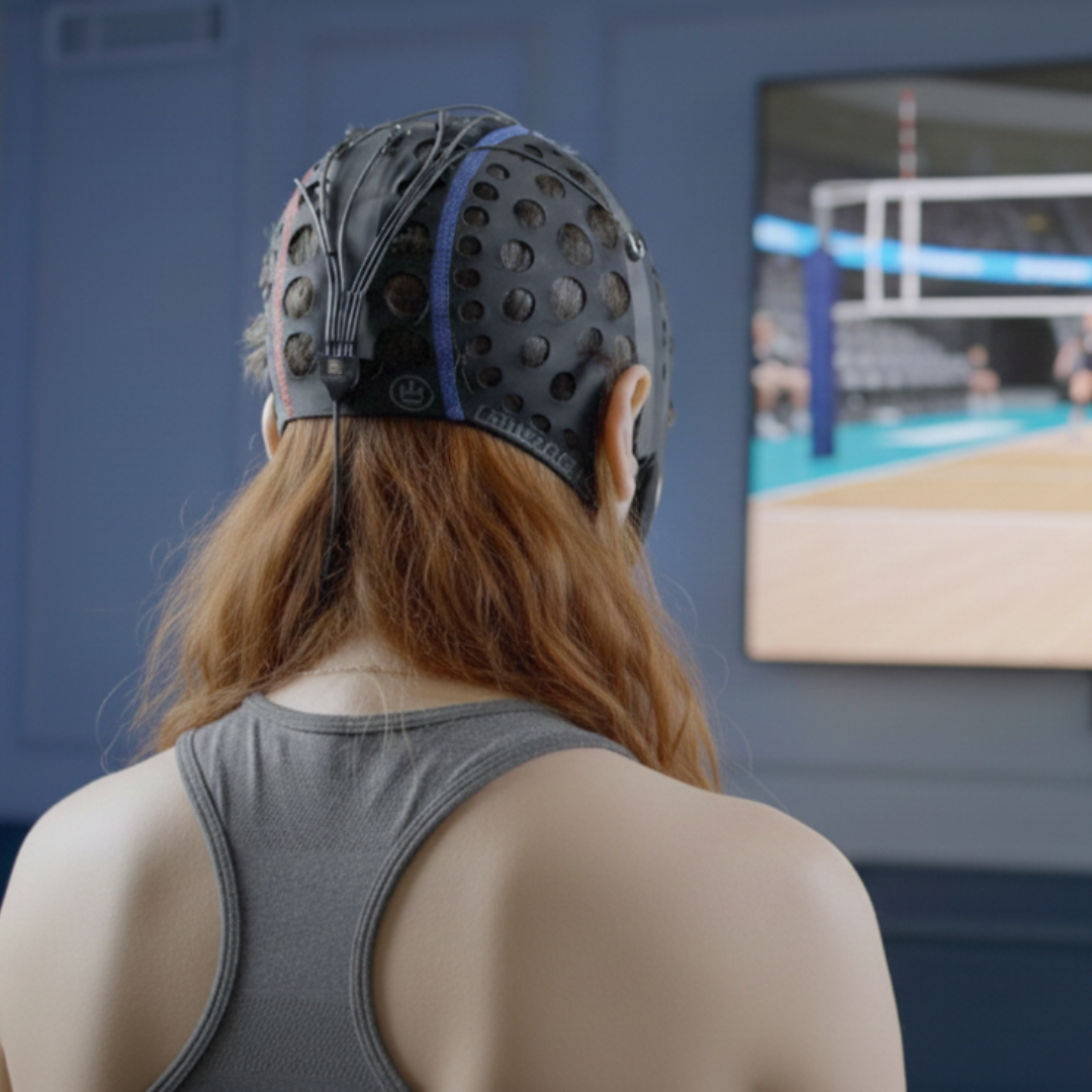 A girl does i-Brain on a tv screen.