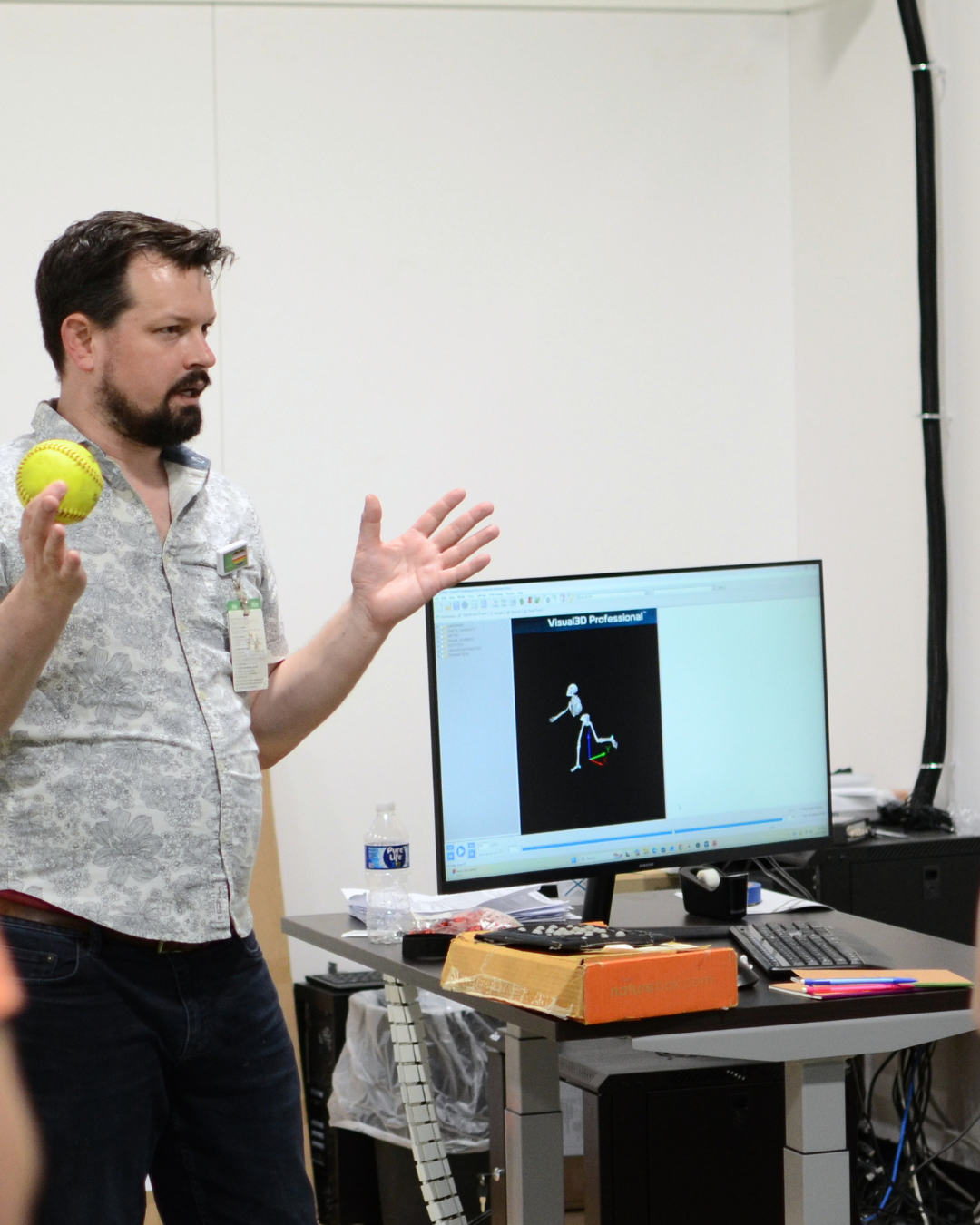 A provider explains the readings at Synapse SRT Motion Analysis Lab inside Sawmill Sports Hub.